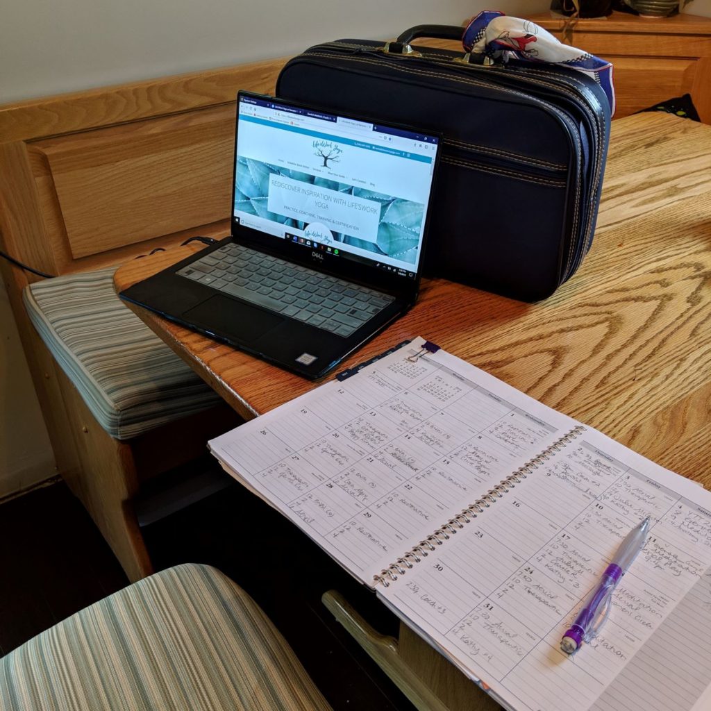 Laptop and calendar notebook