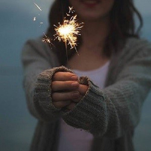 Woman holding a sparkler