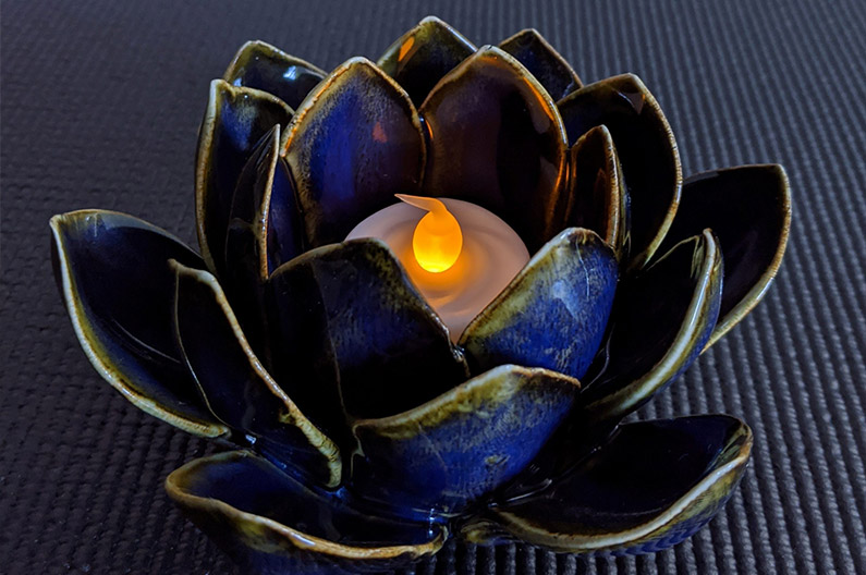 Blue and green lotus candle