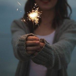 Woman holding a sparkler